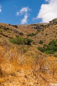 Mountain slopes covered with sparse Mediterranean-type vegetation Stock Photos