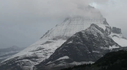 Mountain, snow and clouds glacier park Видео 35169470