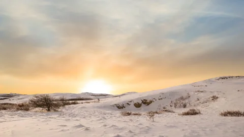 Mountain in a snow at the sunset Stock-Footage 332800204