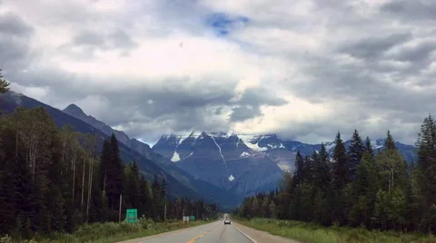 Mountain with snow view from road trip around national park Vídeo Stock 65500467