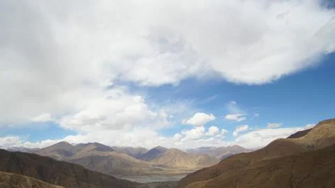 Mountain with some cloud on the blue clear sky Stock Photos