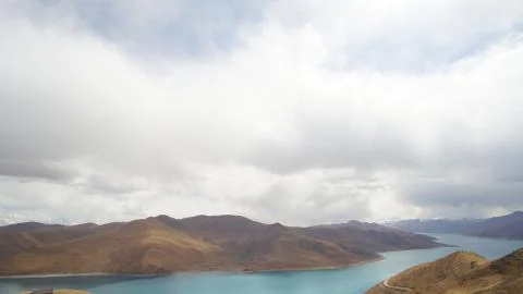 Mountain with some cloud on the blue clear sky and the river Stock Photos