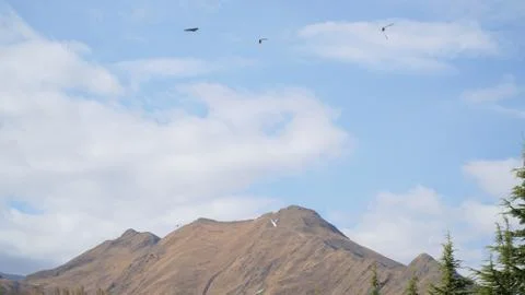 Mountain with some cloud on the blue clear sky Stock Photos