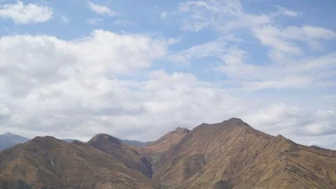 Mountain with some cloud on the blue clear sky Stock Photos
