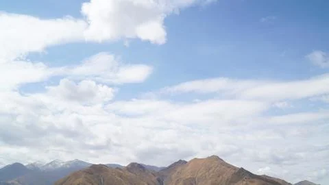 Mountain with some cloud on the blue clear sky Stock Photos
