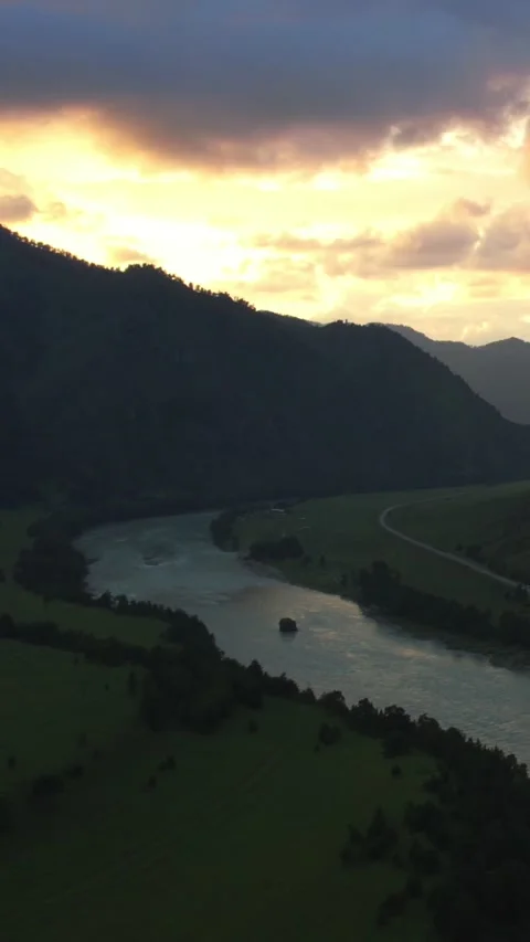 Mountain Spirits Gorge in Altai with river valley and dramatic sunset clouds Stock Footage 335662252