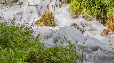 Mountain spring waterfall coming down Stock Footage 31741153