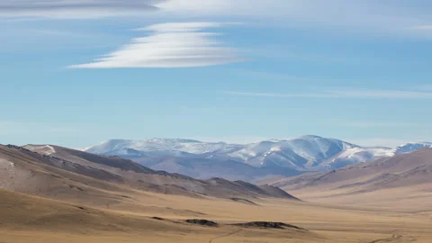 Mountain steppes of Mongolia. On the barren landscape of mountain steppes of Mon Stock Footage 199486500