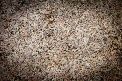 Mountain stone with moss in the background Stock Photos