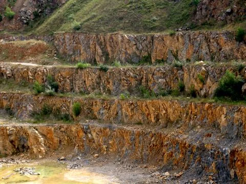 Mountain from stone in quarry Stock Photos