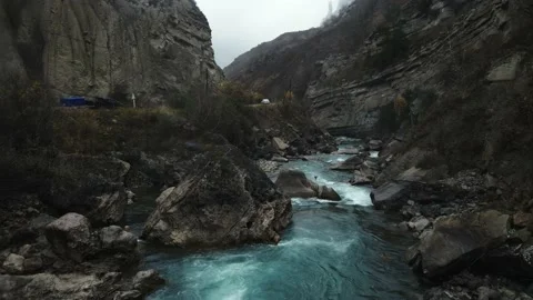 The mountain stormy river rushes forward Stock Footage 169187615