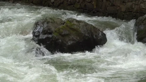 Mountain stream among the stones Stock Footage 114970732