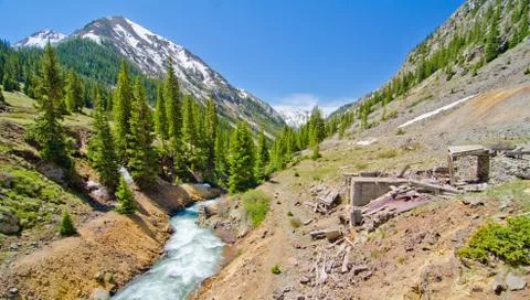 A mountain stream and an old silver mine in animas forks, a ghost town in the Stock Photos