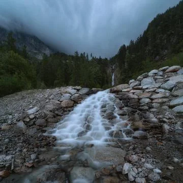 Mountain Stream and Waterfall in Alpine Valley in Tyrol Austria 스톡 사진