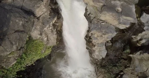 Mountain stream becoming a waterfall in a jungle Video stock 124648582