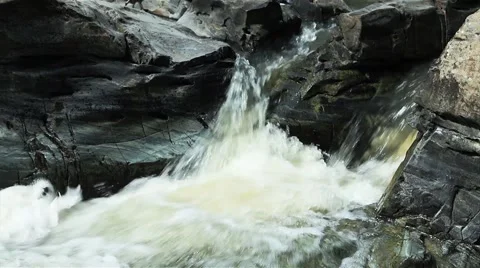 Mountain stream between stones video. Stock Footage 50365797
