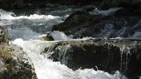 Mountain stream on cascade, slow motion Stock Footage 153907840