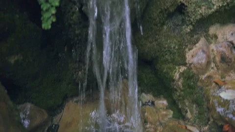 Mountain stream with clear water flowing through stones in autumn nature h Stock Footage 143935114