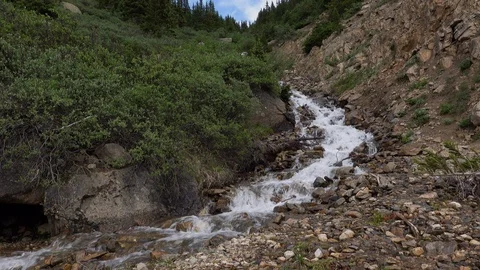Mountain stream down steep rocky ravine. Stock Footage 117579617