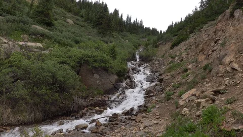 Mountain stream down steep rocky ravine. Stockbeeldmateriaal 118852806