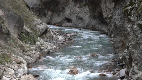 Mountain Stream Flowing Between Rocky Cliffs Stock Footage 318907377