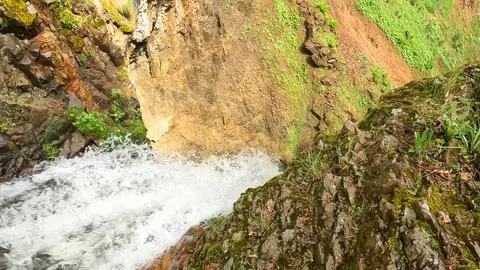Mountain stream flowing close-up shot through rocky gorge in Georgia Stock Footage 338426456