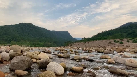 Mountain Stream Flowing Over Rocks in Sylhet with Meghalaya Hills, Bangladesh Stock Footage 341483665
