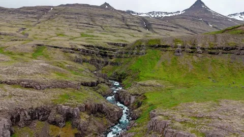 Mountain Stream Flowing Through Canyon Above Snaedalsfoss 動画素材 342708567