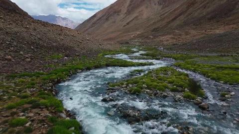 Mountain Stream Flowing Through Rocky Valley Drone View Video stock 311048771