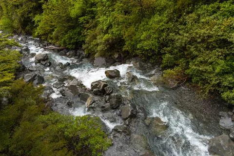 Mountain Stream Flowing Through Rocky Forest Gorge Stock Photos