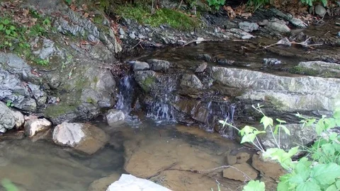 Mountain stream flows in the river Stock Footage 90745286