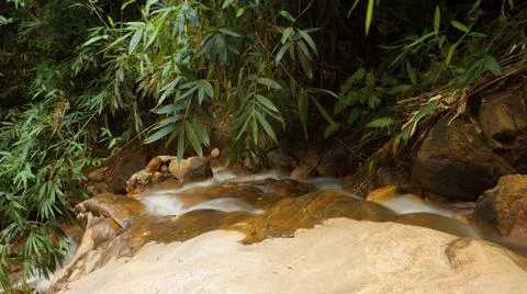 Mountain stream in the forest, long exposure picture Stock Photos