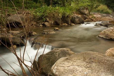 Mountain stream in the forest, long exposure picture Stock Photos
