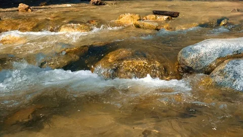 Mountain stream. Forest river. Crystal water falling down the rocks. Close up  Stock Footage 105410687