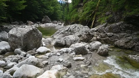 A mountain stream with huge rocks Stock-Footage 260832404