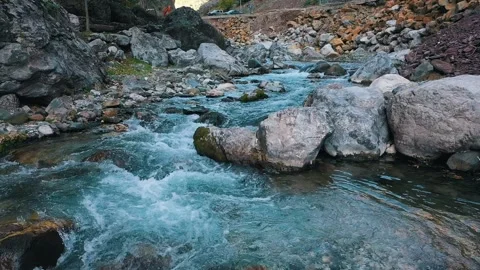 Mountain Stream Over Rocky Riverbed Stock Footage 321005121