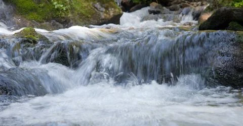 Mountain stream Stock Photos