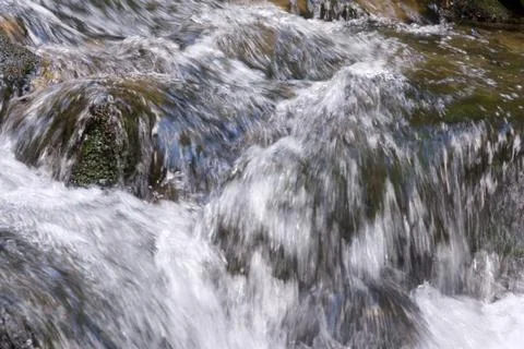 Mountain stream Stock Photos