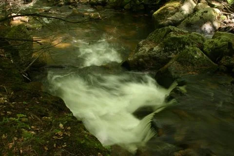 Mountain stream Stock Photos