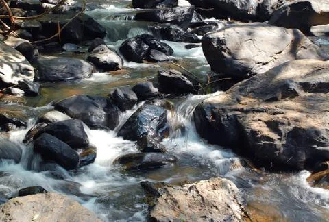 Mountain stream Stock Photos