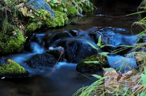 Mountain stream Stock Photos