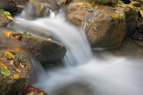 Mountain stream Stock Photos