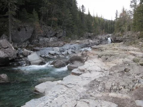 Mountain stream with rocks Stock Photos