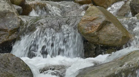 Mountain stream running peaceful over rocks. European Alps. 4K UHD Stock Footage 39254170