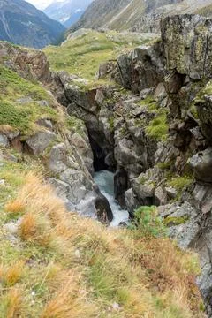 Mountain Stream Rushing Through a Rocky Gorge Stock Photos