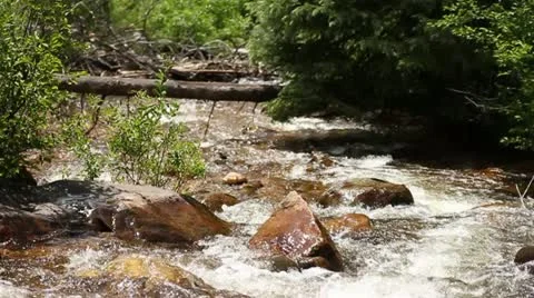 Mountain stream slow motion Stock Footage 22106145