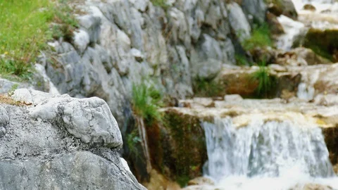 Mountain stream with small waterfalls Stock Footage 98234027