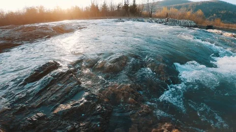 Mountain stream at sunset Waterfall on a mountain river Stock Footage 106511708