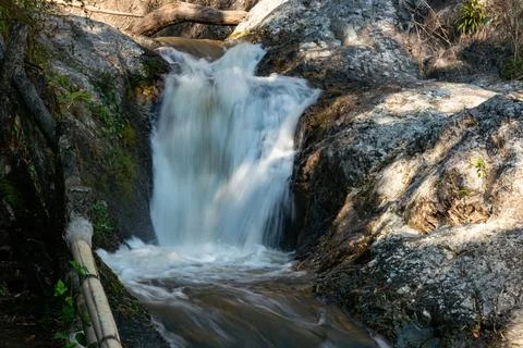 Mountain stream water flowing down over the rocks. Stock-Fotos