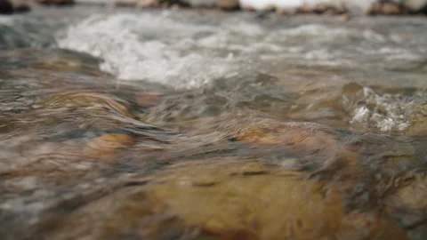 Mountain stream water flowing over rocks Видео 331799686